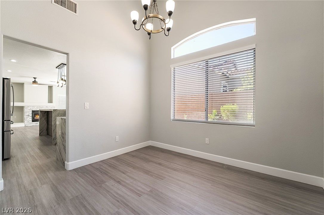 Formal dining area with chandelier
