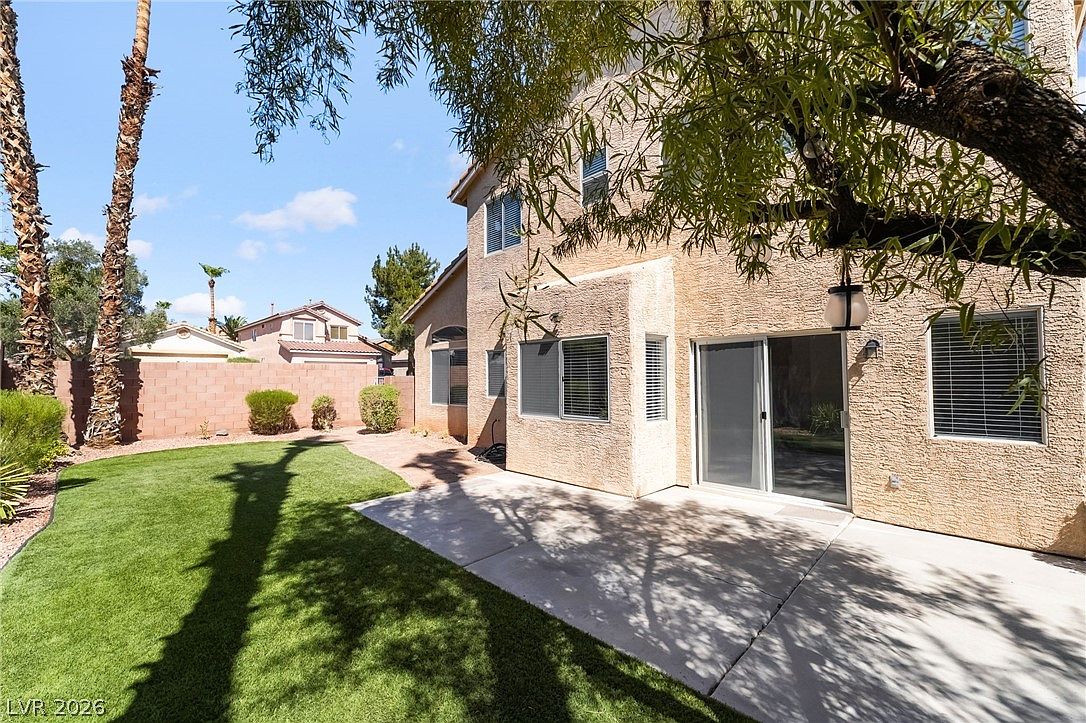 Two-story exterior from the side yard