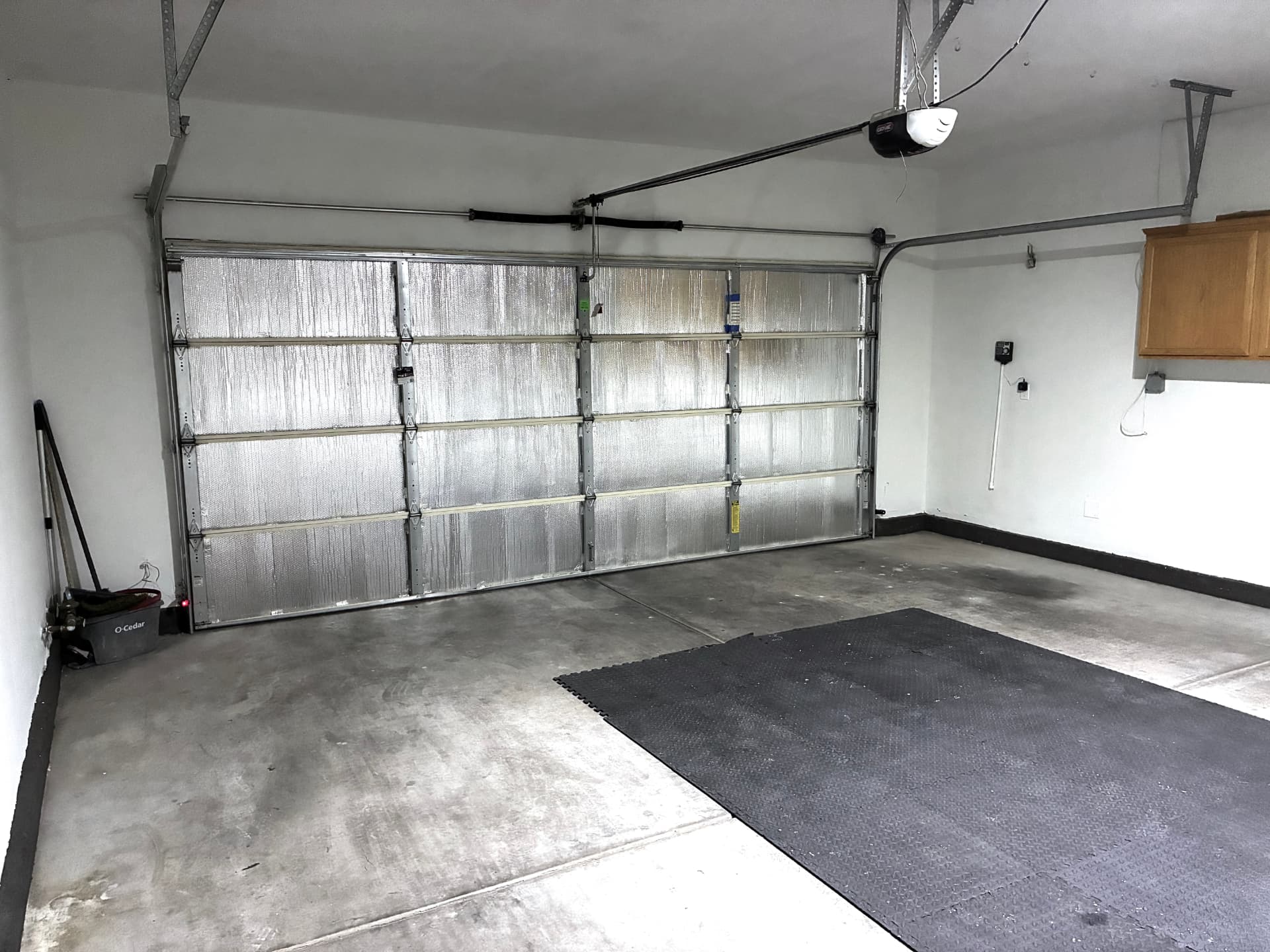 Insulated two-car garage with finished walls